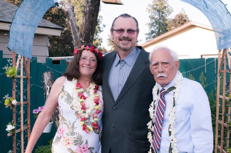 Mom and Gervin with the minister. 